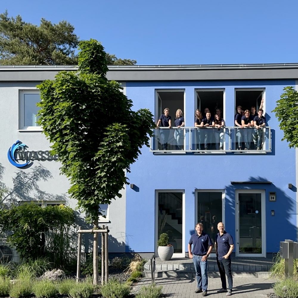 Wasserhaus Gebäude und Team